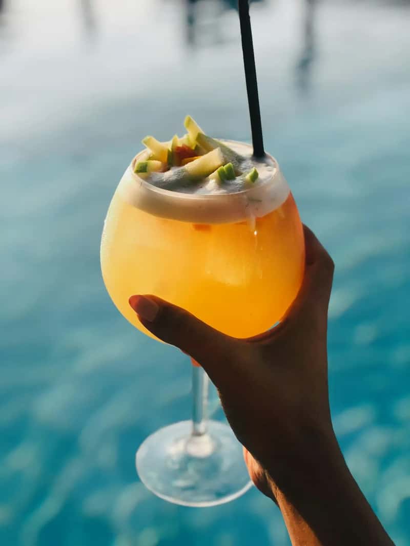 6. A colorful, beach themed cocktail (Image Credits: Unsplash)