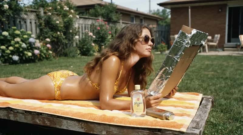 #7 - Baby Oil and a Foil Reflector Instead of Sunscreen (Image Credits: Gemini)