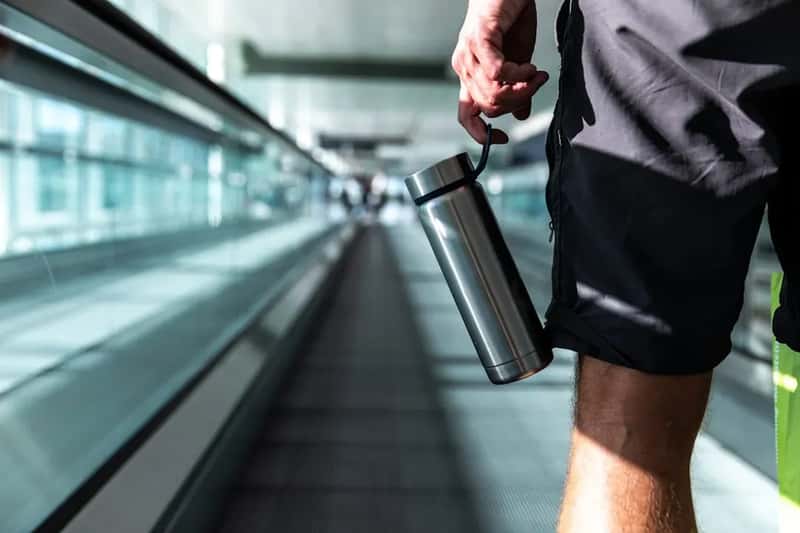 #5 - Bring a Reusable Water Bottle and Fill It After Security (Image Credits: Unsplash)