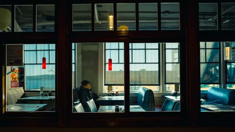 4. Eating dinner alone in the hotel restaurant (Image Credits: Pexels)