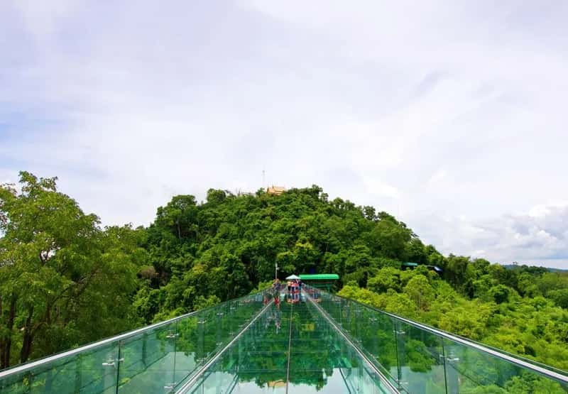 Standing on a glass skywalk or observation deck (Image Credits: Pexels)