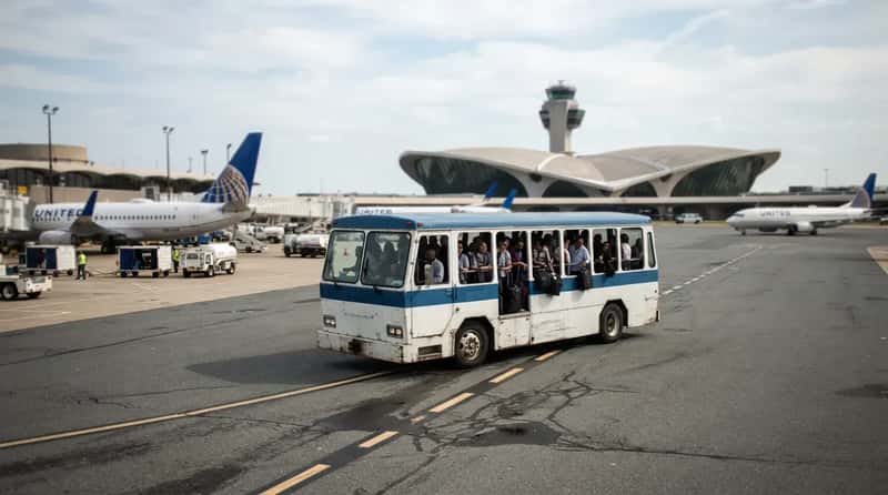 #16 - Dulles Sells 50-Minute Connections That Require a Tarmac Bus Ride (Image Credits: Gemini)