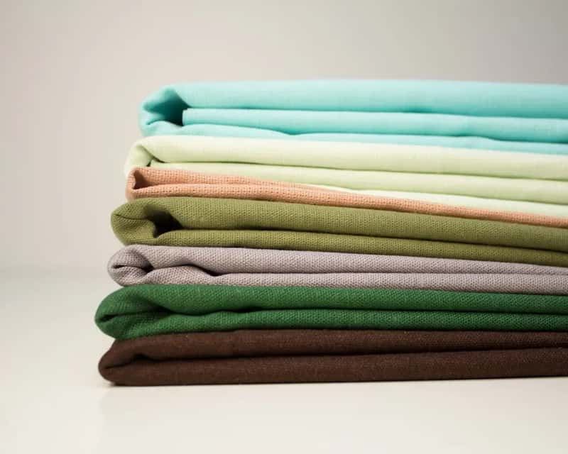 #2 - Wearing Synthetic Fabrics From Head to Toe (Image Credits: Unsplash)