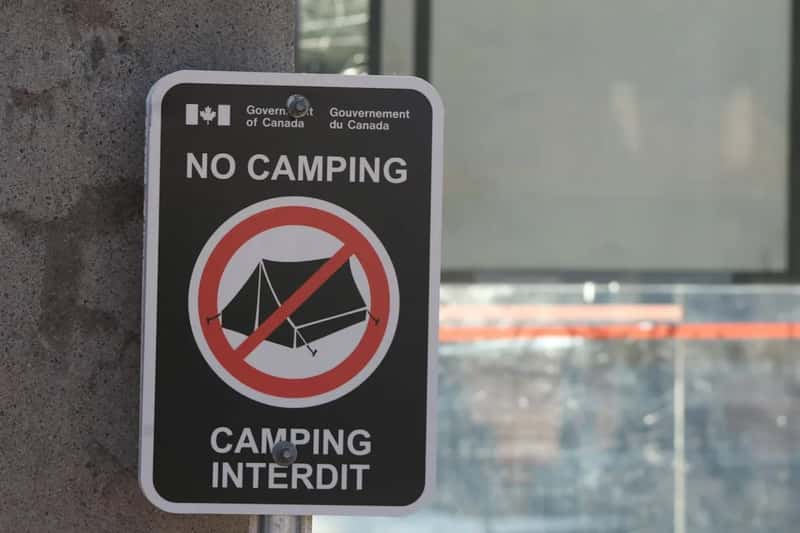 9. Camping or sleeping outside designated sites (Image Credits: Unsplash)