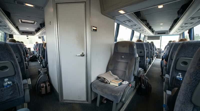 #10 - The Restroom-Adjacent Seat Nobody Admits They Picked (Image Credits: Gemini)