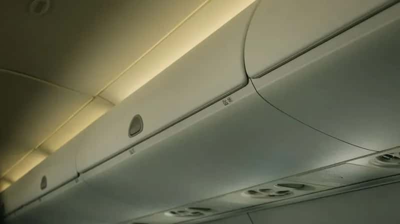 #18 - Store Your Carry-On in the Bin Across the Aisle, Not Above Your Seat (Image Credits: Pexels)