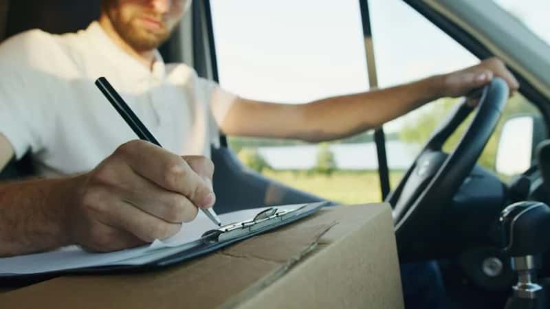 4. Vehicle registration or rental agreement paperwork (Image Credits: Pexels)