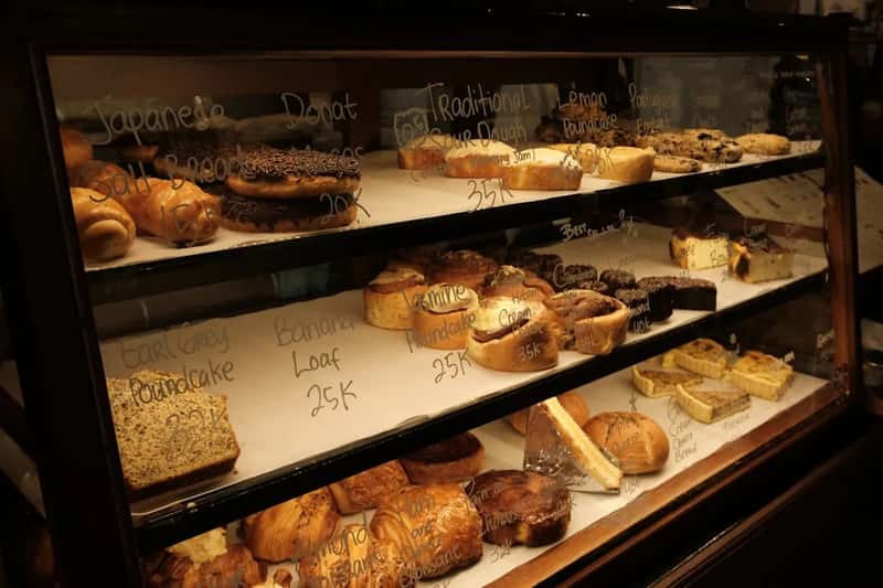 6. Seeking Out Local Bakeries and Markets Over Big Chains (Image Credits: Unsplash)