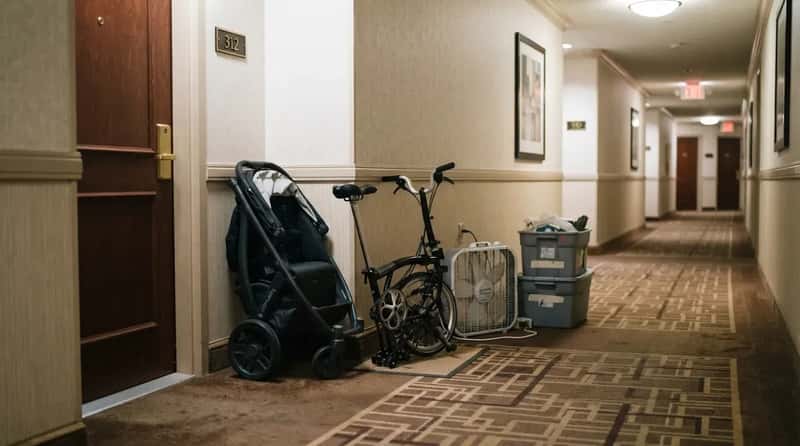 #3 - A Fan, a Stroller or a Bike Parked Outside the Door (Image Credits: Gemini)