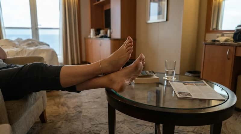 #19 - Putting Bare Feet on Furniture the Moment You Sit Down (Image Credits: Gemini)