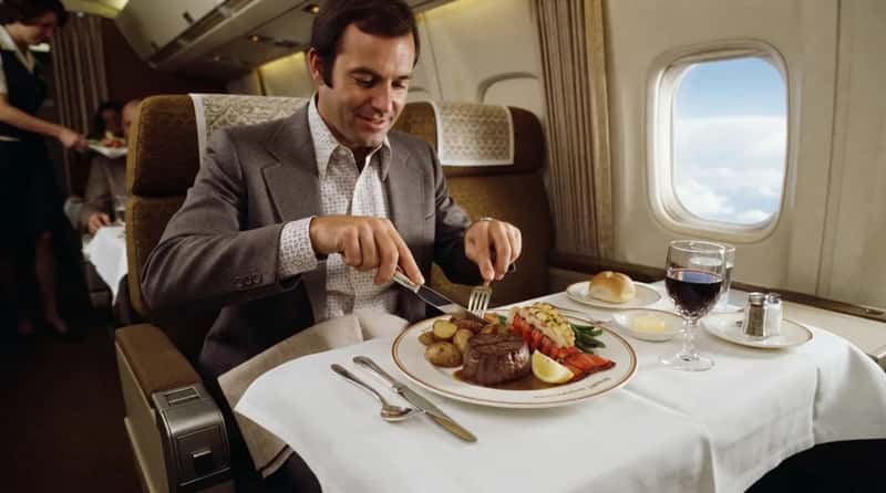 #3 - A Full Steak-and-Lobster Dinner at 30,000 Feet (Image Credits: Gemini)