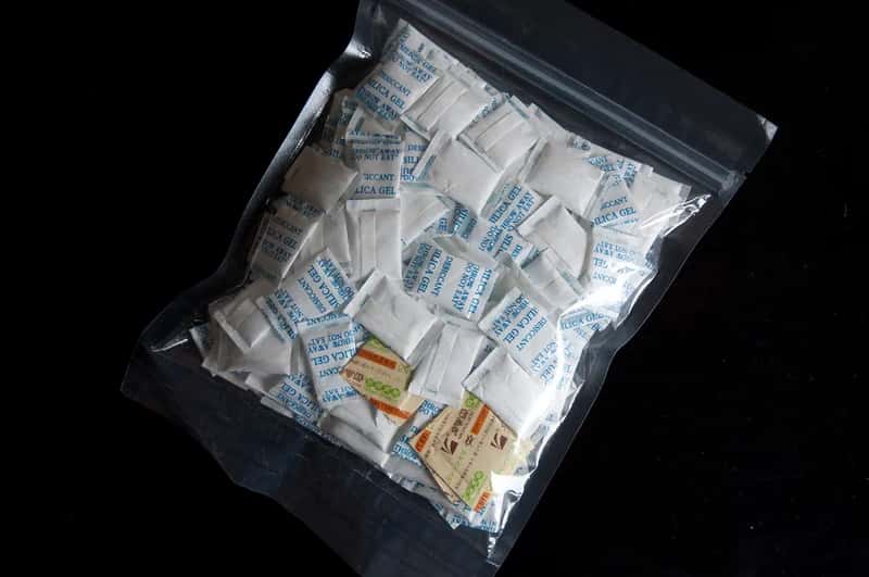1. Silica gel packets tucked into toiletry kits and shoe boxes (kodamapixel, Flickr, CC BY-SA 2.0)