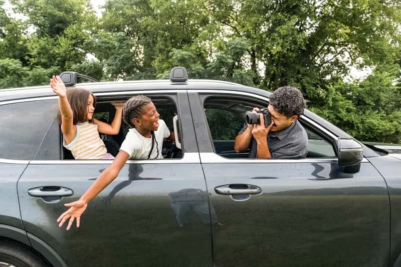 Piling into the family station wagon for a cross country road trip (Image Credits: Unsplash)