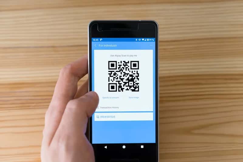 7. Fake QR codes at restaurants, meters, and transit stops (Image Credits: Unsplash)