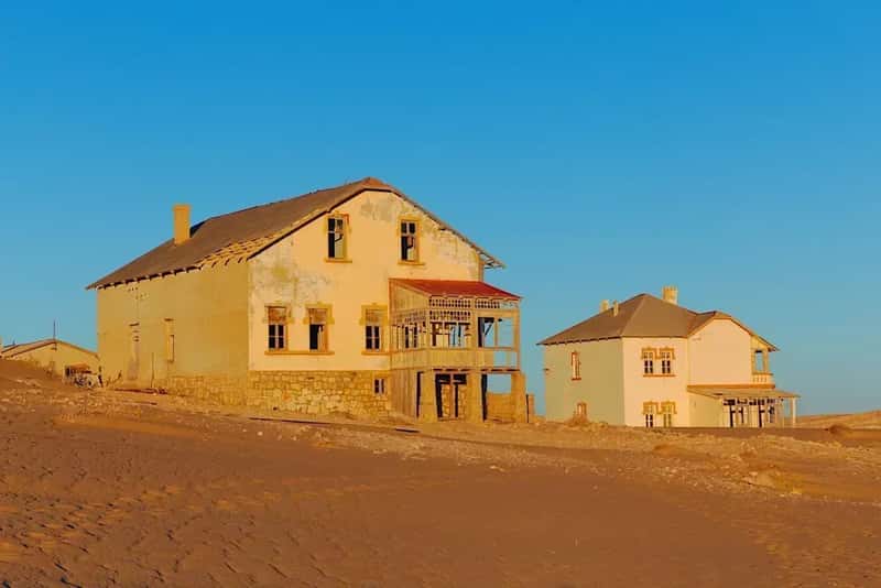 11. Kolmanskuppe, Namibia – Diamond Town Devoured by Dunes (Image Credits: Unsplash)