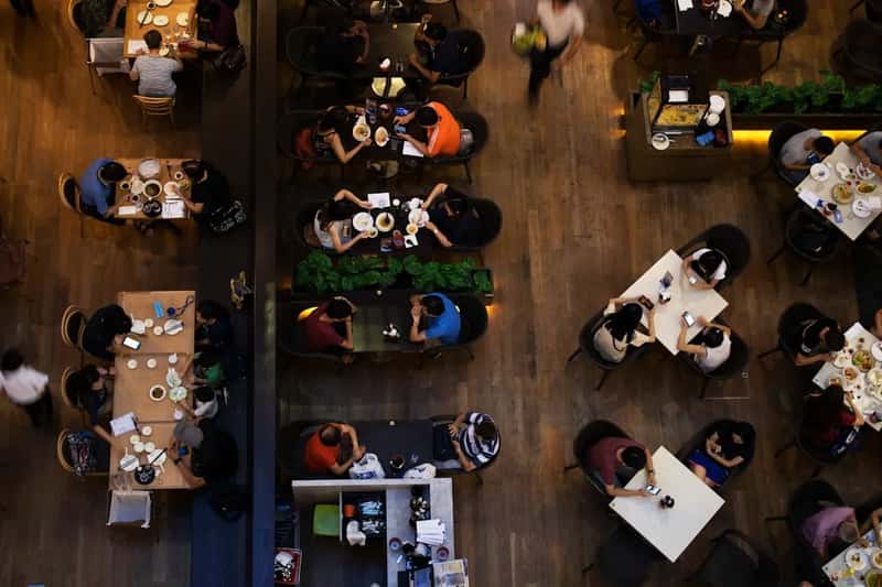 10. Insisting on a different table than the one you're assigned (Image Credits: Unsplash)