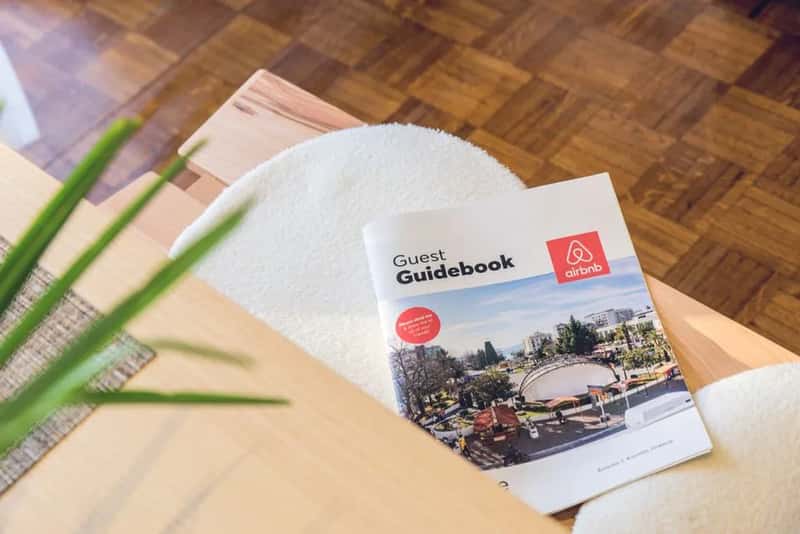 2. Carrying a printed guidebook or paper map (Image Credits: Pexels)
