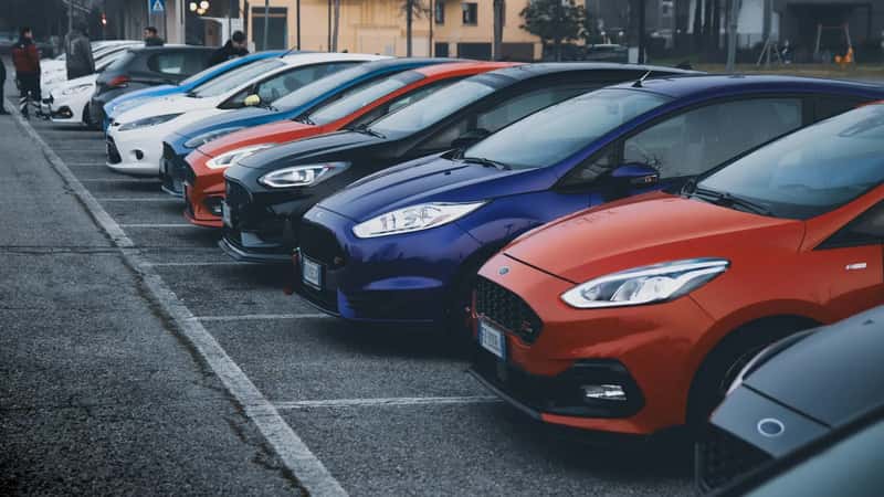 Rental cars and rideshares over black car service (Image Credits: Unsplash)