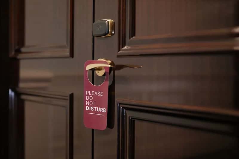 5. They Leave the Do Not Disturb Sign Up All Day, Even When They're Out (Image Credits: Pexels)