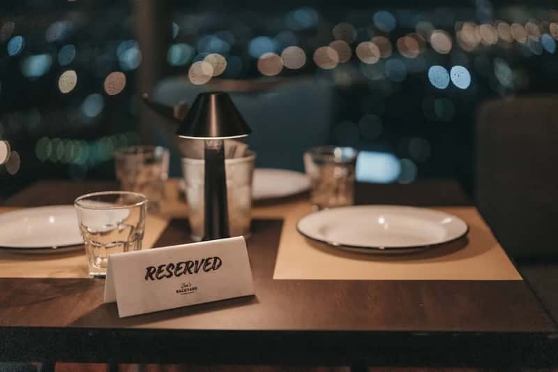13. Table settings include disposable or oddly generic elements despite claiming to be upscale (Image Credits: Unsplash)