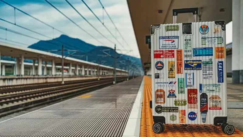 2. Leaving Old Flight Stickers and Tags Stuck to the Shell (Image Credits: Pexels)