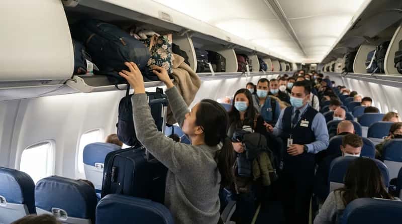 #15 - Why Crew Beg You to Leave Overhead Bins Alone Mid-Boarding (Image Credits: Gemini)