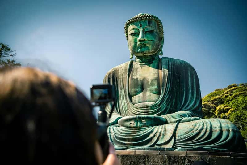 Treating Buddha Images as Photo Props (Image Credits: Unsplash)
