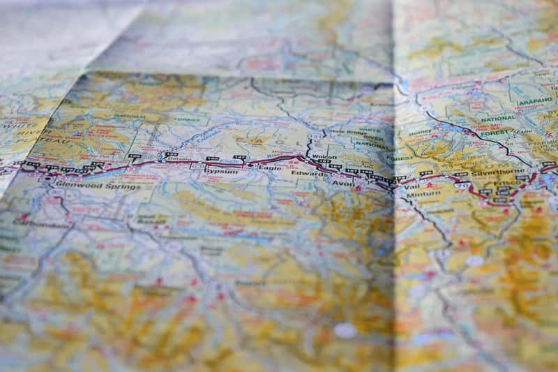 2. The Physical Paper Map Ritual (Image Credits: Unsplash)