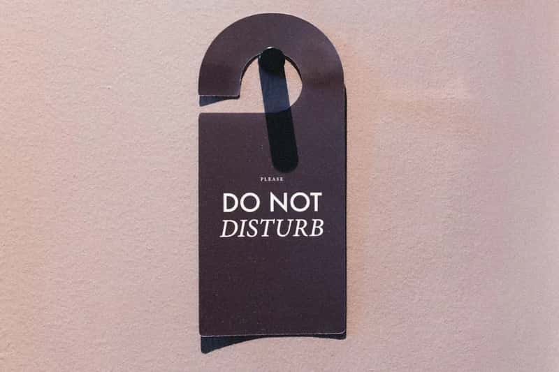 3. The Do Not Disturb Sign Gets Used as a Tool, Not a Weapon (Image Credits: Unsplash)