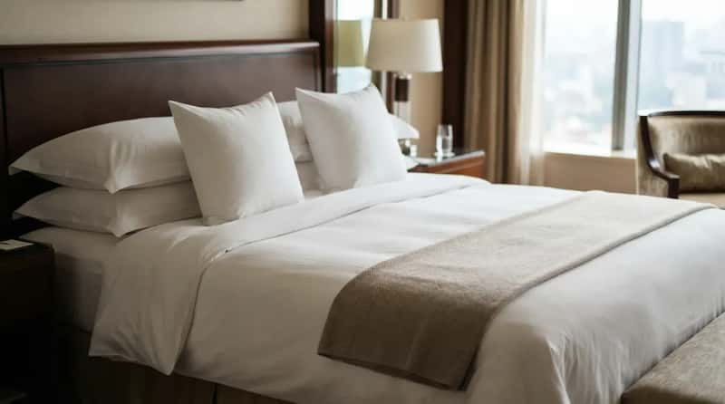 #10 - Housekeeping Already Knows Your Pillow Situation (Image Credits: Gemini)