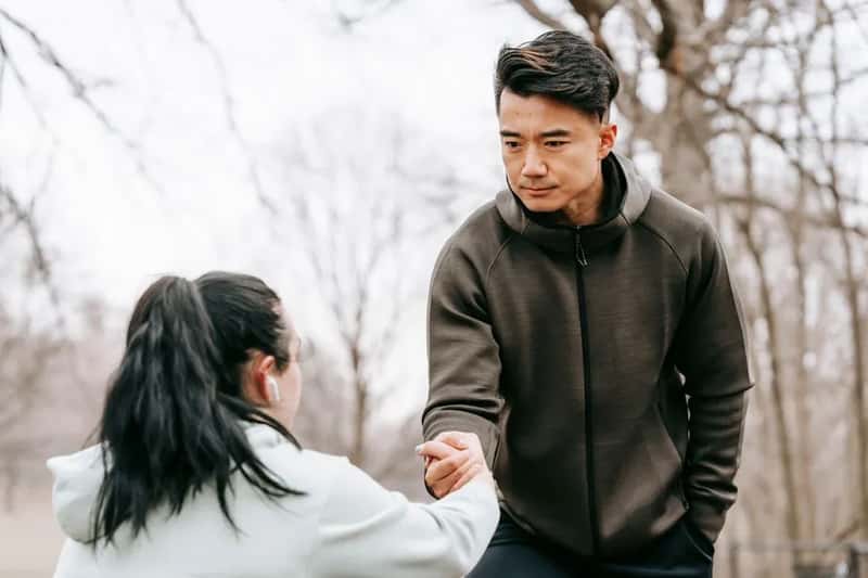 6. Offering to handle an uncomfortable interaction (Image Credits: Pexels)