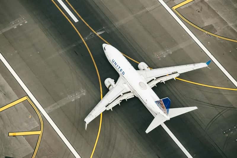 International Flights Raise the Stakes (Image Credits: Unsplash)