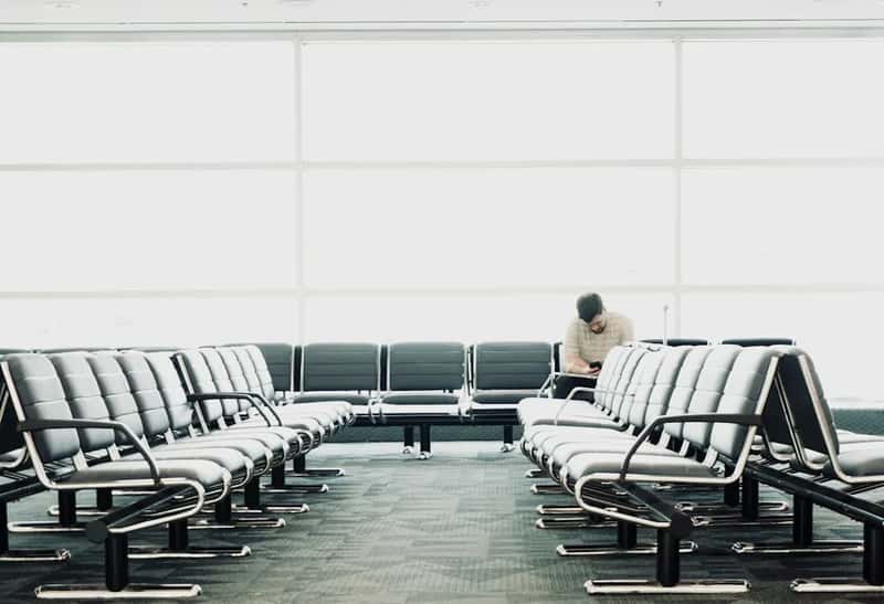 Fidgeting, restlessness, or shifting weight while waiting (Image Credits: Unsplash)