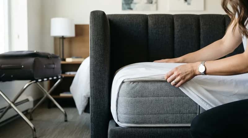 #2 - They Inspect the Mattress Seams and Headboard (Image Credits: Gemini)