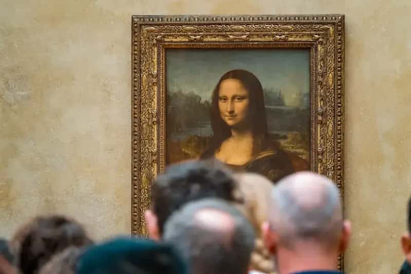 8. The Mona Lisa at the Louvre, Paris: The World's Most Famous Letdown (Image Credits: Unsplash)