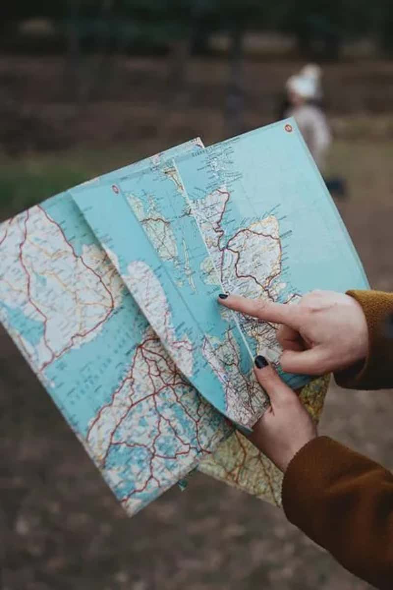 2. Whipping Out an Actual Paper Map in Public (Image Credits: Pexels)