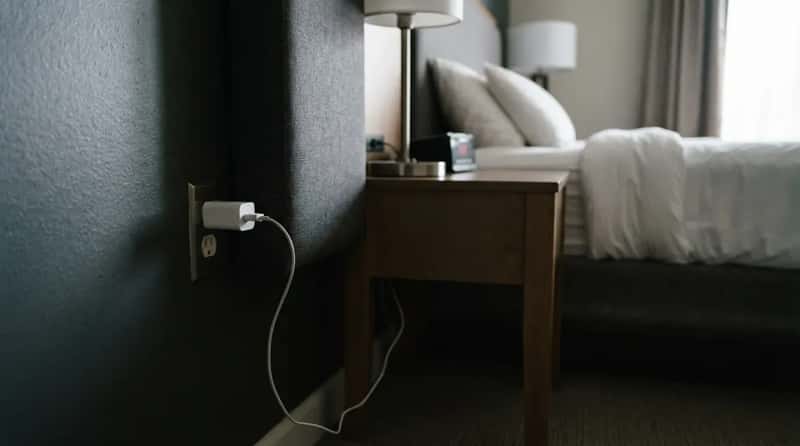 #14 - The Phone Charger Still Plugged In Behind the Bed (Image Credits: Gemini)