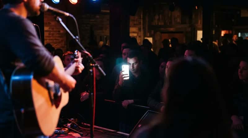 #11 - A Glowing Phone Screen Is the First Thing the Stage Sees (Image Credits: Gemini)