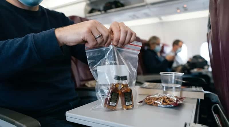 #16 - Mini Liquor Bottles People Buy to Drink on the Plane - Then Can't Open (Image Credits: Gemini)