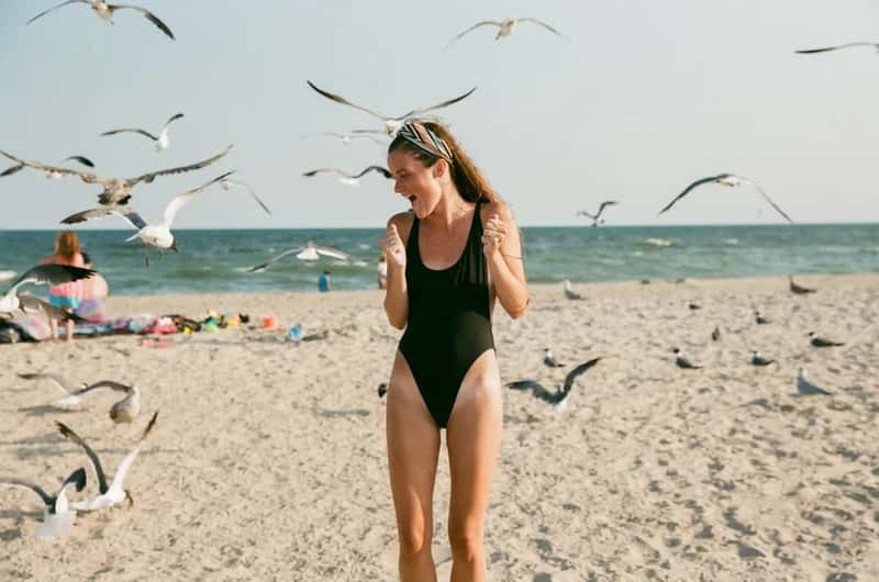 1. Putting on a swimsuit at the beach or pool (Image Credits: Unsplash)