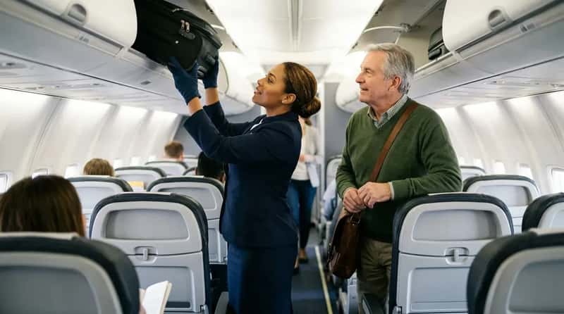 #11 - Carrying Carry-On Luggage to the Seat When Lifting Is a Problem (Image Credits: Gemini)