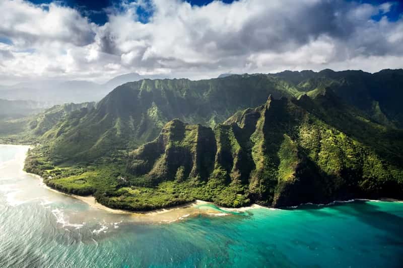 Paradise now comes with a reservation number (Image Credits: Unsplash)