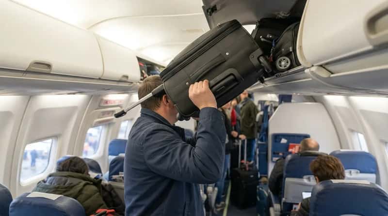 #4 - Loading Your Bag Wheels-First Into the Bin (Image Credits: Gemini)