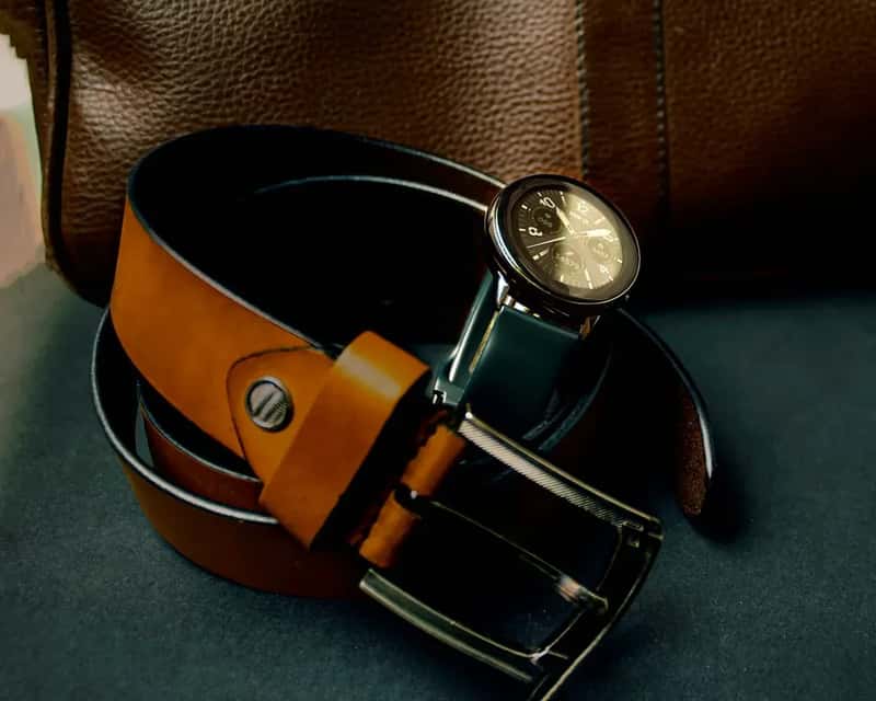#5 - Line Your Suitcase Walls With Rolled Belts and Flat Accessories (Image Credits: Unsplash)