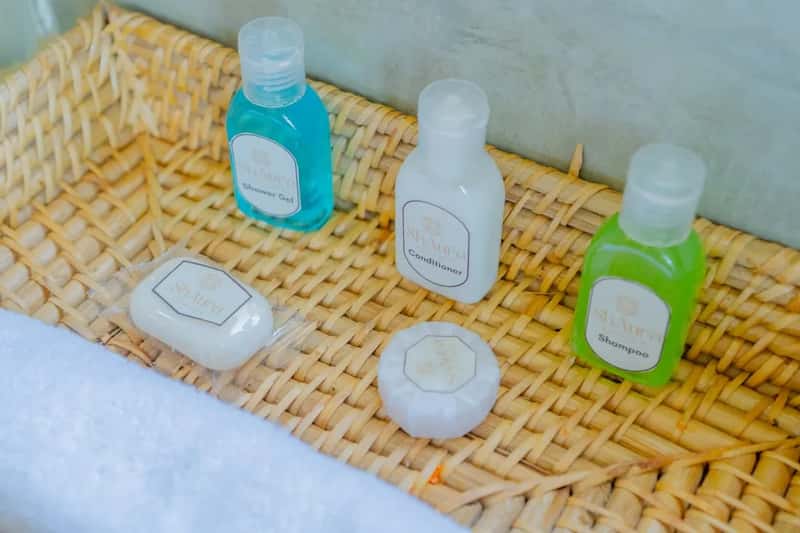 1. Miniature shampoo, conditioner, and lotion bottles (Image Credits: Unsplash)