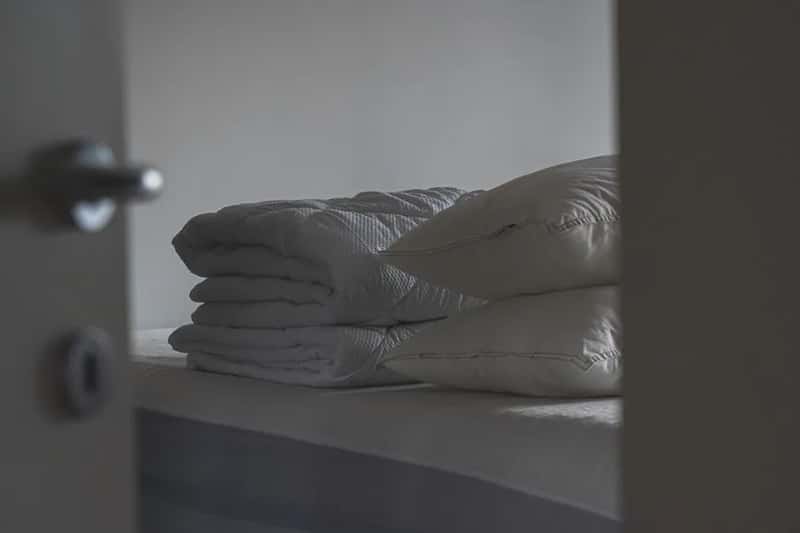 1. A Specific Pillow and Bedding Preference (Image Credits: Pexels)