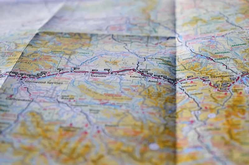 2. Reading paper maps and getting lost on purpose (Image Credits: Unsplash)