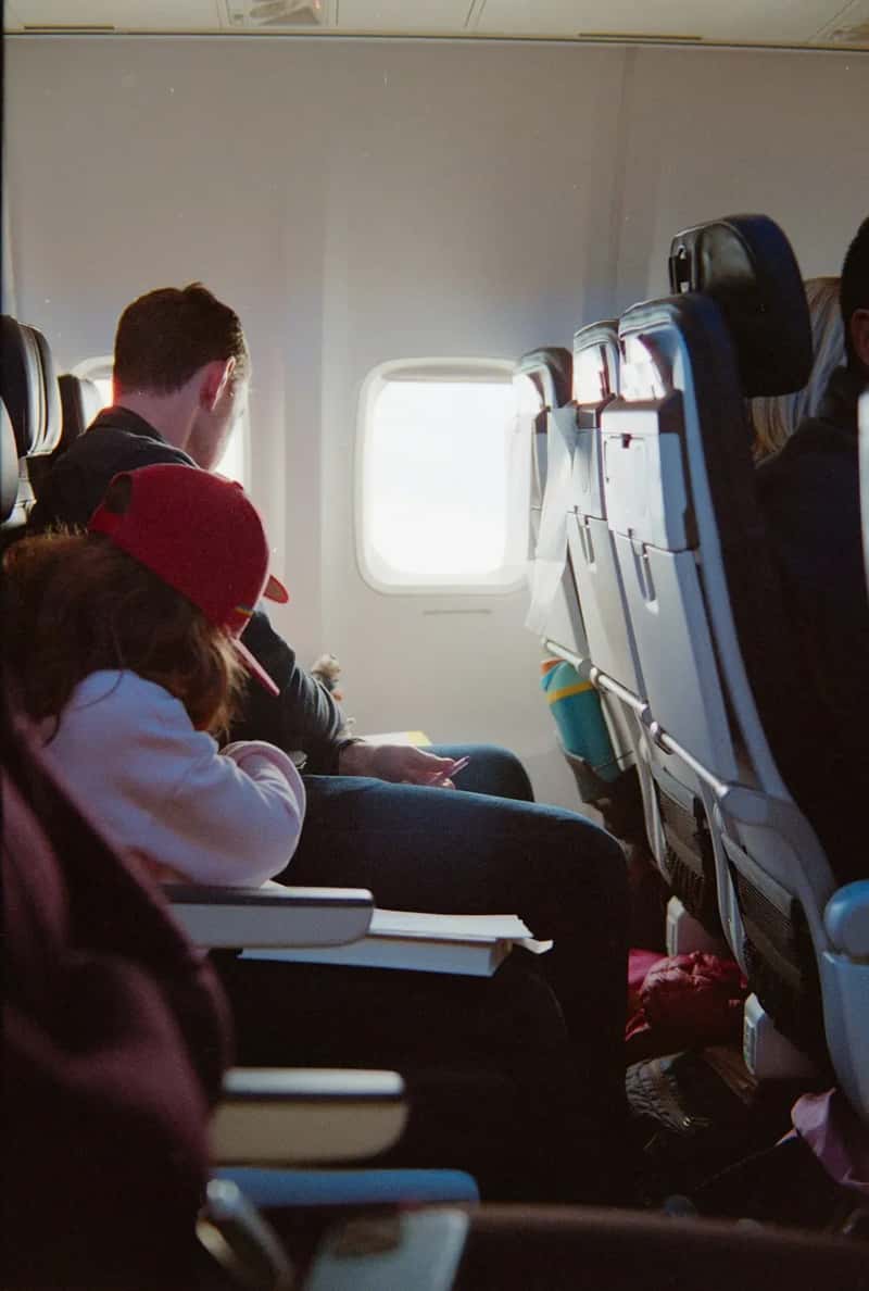 #2 - Traveling in a Group and Not Locking In Seats Together Early (Image Credits: Unsplash)