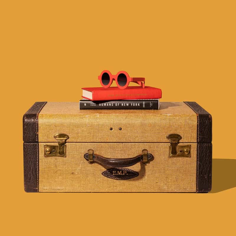 7. Packing an entire suitcase of paperback books and travel games (Image Credits: Unsplash)