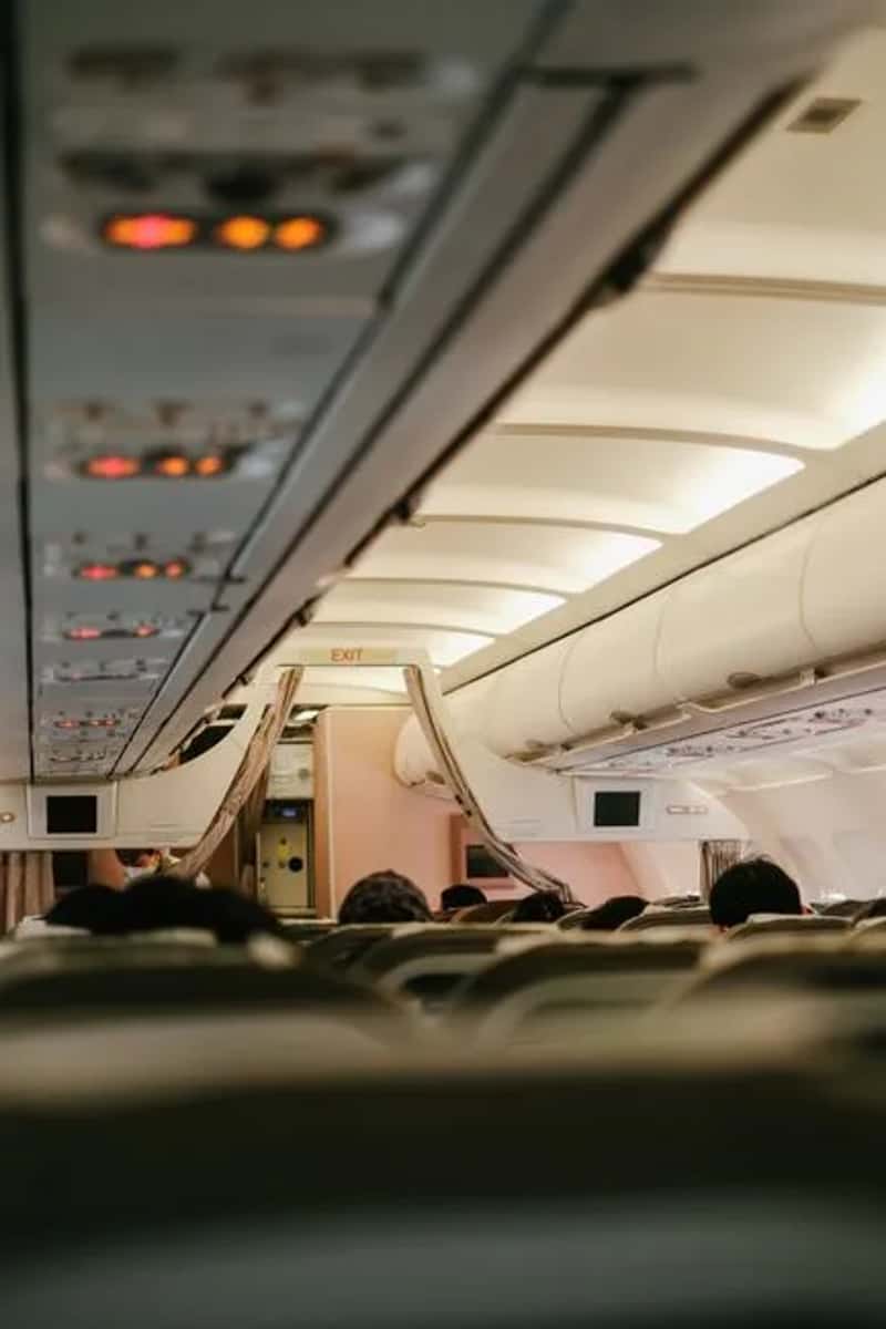 3. Grabbing an exit row seat without understanding the trade-offs (Image Credits: Pexels)